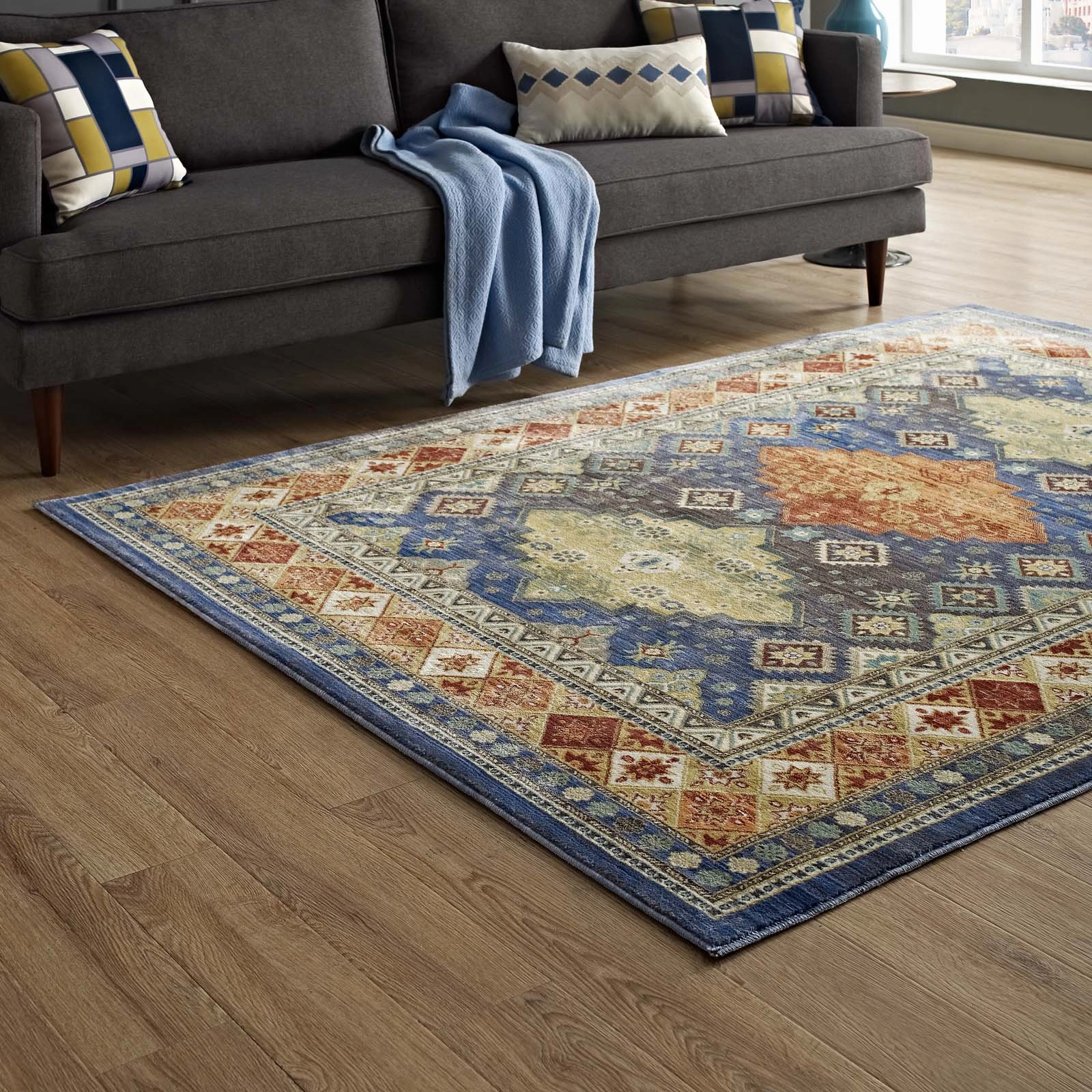 Atzi  Distressed 
Southwestern Diamond Floral Area Rug by Modway